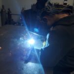 A person welding something.